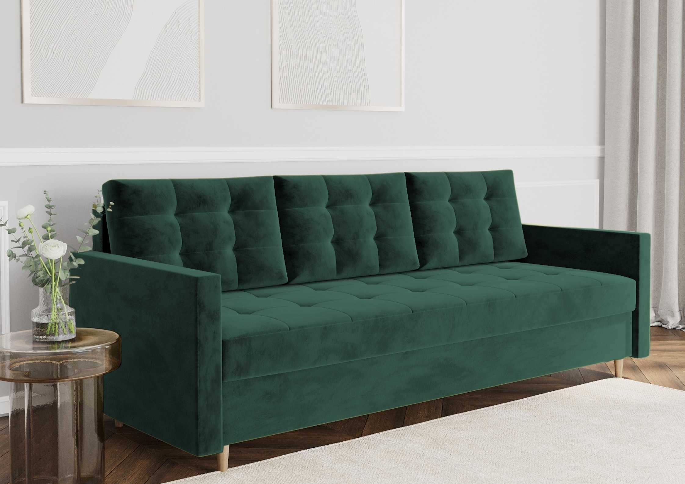 Pikowana sofa z funkcją spania na drewnianych nogach w kolorze zielonym